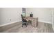 Home office with desk, chair, and ample natural light at 291 Mossy River Ct, Brandon, FL 33511