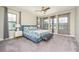 Spacious bedroom with a large bed, water view, and ample natural light at 291 Mossy River Ct, Brandon, FL 33511