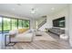 Spacious living room with large sectional sofa and access to backyard at 291 Mossy River Ct, Brandon, FL 33511