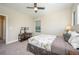 Bright bedroom with a queen-size bed and plenty of natural light at 291 Mossy River Ct, Brandon, FL 33511