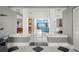 Bright and airy foyer with view to living room and water at 200 Colony Point S Rd, St Petersburg, FL 33705