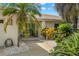 House exterior with lush landscaping and walkway at 200 Colony Point S Rd, St Petersburg, FL 33705