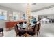 Elegant dining room with glass table and chandelier at 200 Colony Point S Rd, St Petersburg, FL 33705