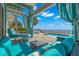 Relaxing patio overlooking the pool and waterfront at 200 Colony Point S Rd, St Petersburg, FL 33705