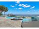 Relaxing pool and spa area with tranquil waterfront views at 200 Colony Point S Rd, St Petersburg, FL 33705