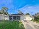 Newly built home with a two car garage and screened porch at 5015 17Th St, Zephyrhills, FL 33542