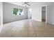 Bright bedroom with tile floors and ceiling fan at 2413 Riverbluff Pkwy # V-231, Sarasota, FL 34231
