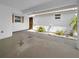 Covered entryway with access to the front door and side yard at 2413 Riverbluff Pkwy # V-231, Sarasota, FL 34231