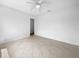 Spacious bedroom with tile floors and ceiling fan at 2413 Riverbluff Pkwy # V-231, Sarasota, FL 34231