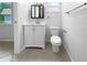 Clean bathroom with toilet and vanity at 2413 Riverbluff Pkwy # V-231, Sarasota, FL 34231