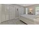 Bedroom with double closets and tiled floors at 3228 Hercules Rd, Venice, FL 34293