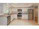 Updated kitchen with stainless steel appliances and granite countertops at 3720 Orangepointe Rd, Valrico, FL 33596
