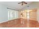 Living room with tile floors and french doors leading to patio at 3720 Orangepointe Rd, Valrico, FL 33596