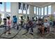 The fitness center is filled with high end equipment, weights, and space to workout at 8904 Bernini Pl, Sarasota, FL 34240