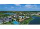 Community overview showcasing a resort-style pool, playground, and basketball court at 8904 Bernini Pl, Sarasota, FL 34240