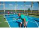 Enjoy recreational activities with a community pickleball and basketball court at 8904 Bernini Pl, Sarasota, FL 34240