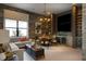 Game room with large TV, wet bar, and comfortable seating area at 8904 Bernini Pl, Sarasota, FL 34240