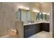 Elegant bathroom with double vanity, large mirror, and walk-in shower at 8904 Bernini Pl, Sarasota, FL 34240