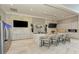 Community kitchen with island seating, stainless appliances, and marble accents at 18324 Rockport Pl, Lakewood Ranch, FL 34211