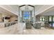 Upscale lobby with soaring ceilings, elegant seating, and community amenities access at 18324 Rockport Pl, Lakewood Ranch, FL 34211