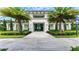 Community clubhouse featuring a grand entrance and landscaping at 18324 Rockport Pl, Lakewood Ranch, FL 34211
