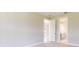 Bedroom with door to en-suite bathroom at 18324 Rockport Pl, Lakewood Ranch, FL 34211