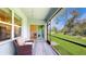 Screened porch with access to the dining area and view of backyard at 108 Castile Ct, Punta Gorda, FL 33983