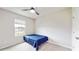 Bright bedroom with a double bed, window, and ceiling fan at 108 Castile Ct, Punta Gorda, FL 33983