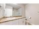 Clean bathroom with a single sink vanity, toilet, and shower/tub combo at 108 Castile Ct, Punta Gorda, FL 33983