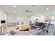 Spacious living room with sectional sofa and large windows at 108 Castile Ct, Punta Gorda, FL 33983
