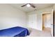 Bedroom with a double bed, double door closet, and access to a bathroom at 108 Castile Ct, Punta Gorda, FL 33983