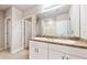 Double vanity bathroom with white cabinets at 108 Castile Ct, Punta Gorda, FL 33983
