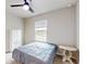 Spacious bedroom with a queen bed, window, and storage at 108 Castile Ct, Punta Gorda, FL 33983