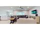 Spacious living area with sectional sofa and large TV at 108 Castile Ct, Punta Gorda, FL 33983