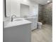 Updated bathroom with double sinks and a walk-in shower at 790 Harvard St, Englewood, FL 34223