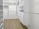 Large walk-in closet with ample shelving and hanging space at 790 Harvard St, Englewood, FL 34223