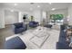Open living room with modern furniture and hardwood floors at 790 Harvard St, Englewood, FL 34223