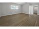 Large bedroom with hardwood floors and a walk-in closet at 790 Harvard St, Englewood, FL 34223