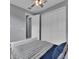 Guest bedroom with a white bed frame and built-in closet at 82 Fairway Rd, Rotonda West, FL 33947