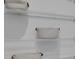 Walk-in closet with wire shelving and fabric storage baskets at 82 Fairway Rd, Rotonda West, FL 33947