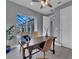 Home office with pool view and sliding glass doors at 82 Fairway Rd, Rotonda West, FL 33947