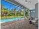Relaxing screened pool and patio area, perfect for outdoor entertaining at 82 Fairway Rd, Rotonda West, FL 33947