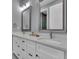 Bathroom with double vanity and modern quartz countertops at 82 Fairway Rd, Rotonda West, FL 33947