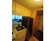 Simple kitchen with stainless steel fridge at 36750 Us Highway 19 N # 13-216, Palm Harbor, FL 34684