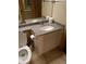 Bathroom with granite vanity and toilet at 36750 Us Highway 19 N # 13-216, Palm Harbor, FL 34684