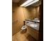 Clean bathroom with tiled floor, toilet, sink, and bathtub at 36750 Us Highway 19 N # 13-216, Palm Harbor, FL 34684