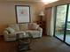 Living room with comfortable sofa and coffee table at 36750 Us Highway 19 N # 13-216, Palm Harbor, FL 34684