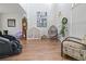 Gathering-friendly living room with hardwood floors and natural light at 8231 Dunham Station Dr, Tampa, FL 33647