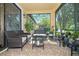 Spacious screened porch, perfect for relaxing and enjoying the outdoors at 8231 Dunham Station Dr, Tampa, FL 33647