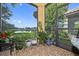 Enjoy the view from this screened porch, filled with plants at 8231 Dunham Station Dr, Tampa, FL 33647